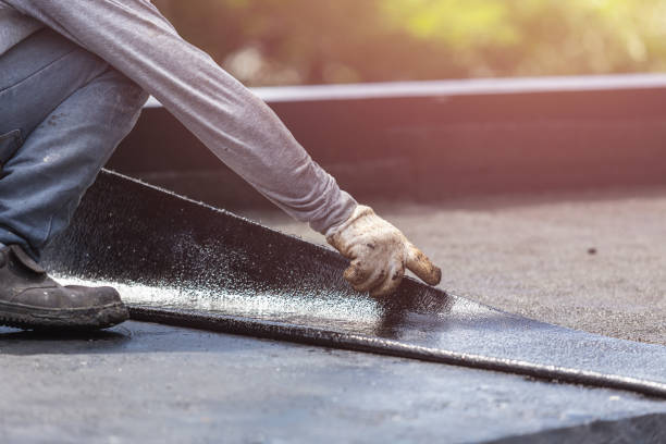 Professional Basement Waterproofing technician working in Marion, KS